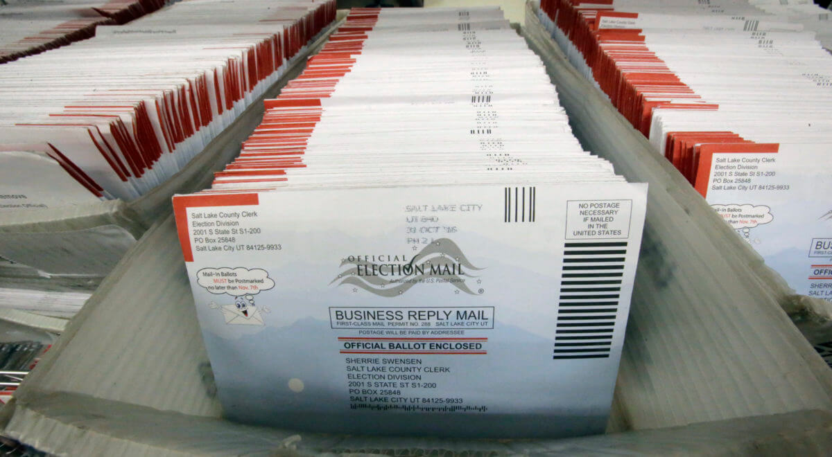 Vote By Mail In this Nov. 1, 2016, file photo, mail-in ballots for the 2016 General Election are shown at the elections ballot center at the Salt Lake County Government Center, in Salt Lake City. (AP Photo/Rick Bowmer, File)