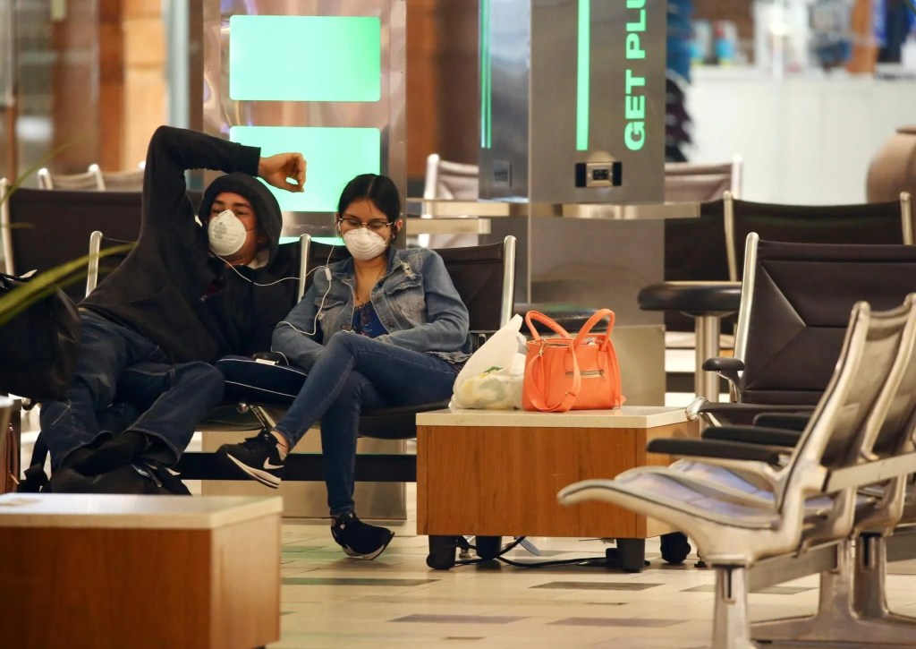 Viral Video Shows Packed Phoenix Airport as CDC Begs People to Stay Home