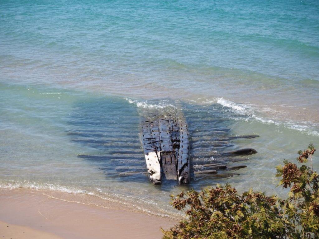 A Shipwreck Just Washed Ashore Lake Michigan — And Legend Says It Was Sacked By A Pirate