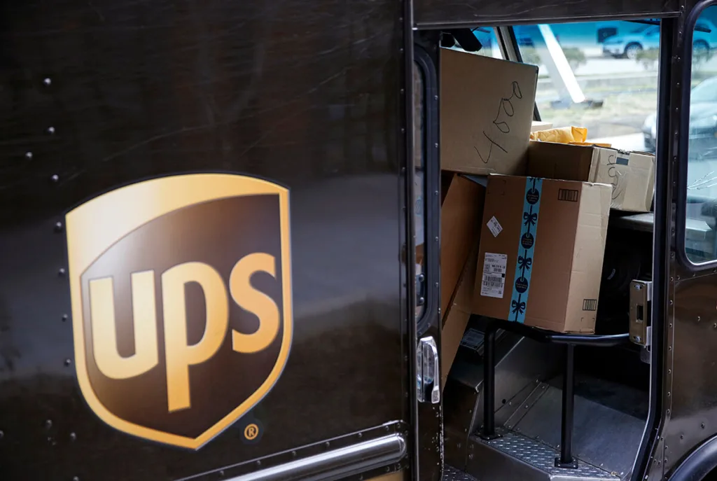UPS truck showing packages stacked up inside