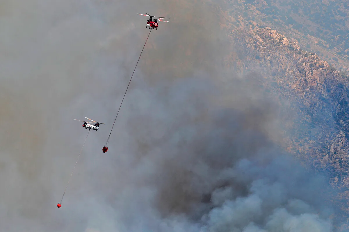Helicopters battling Bighorn Fire