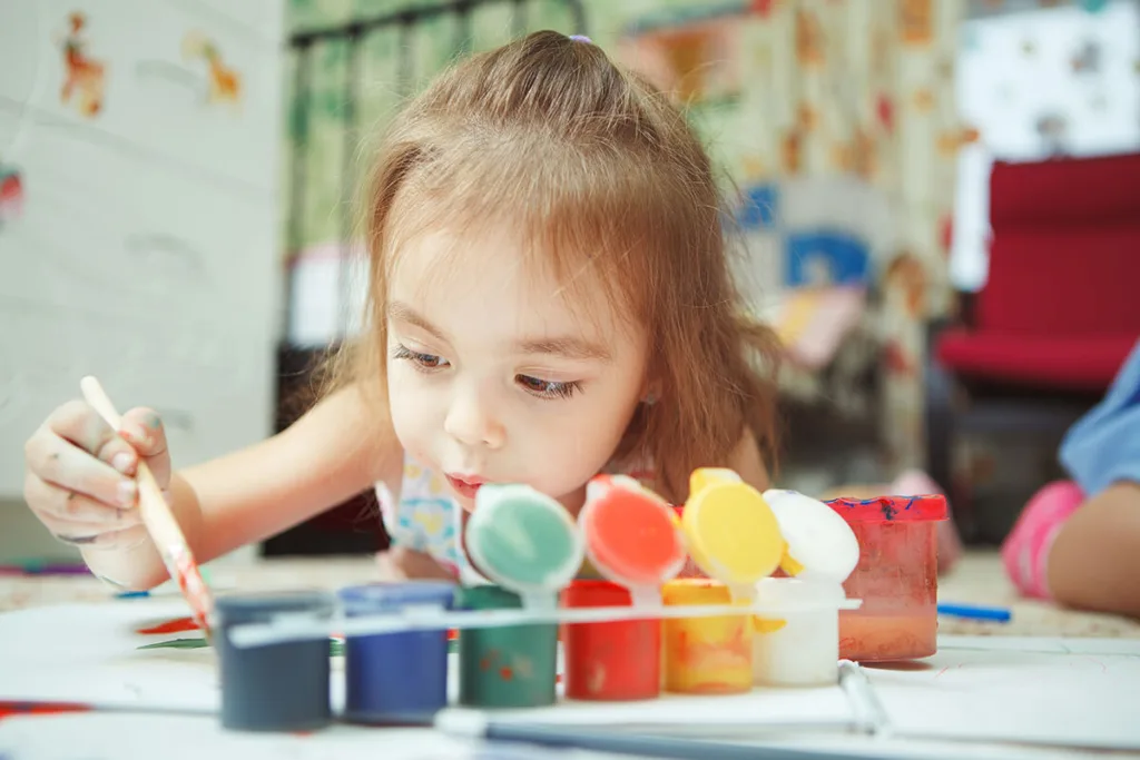 little girl painting