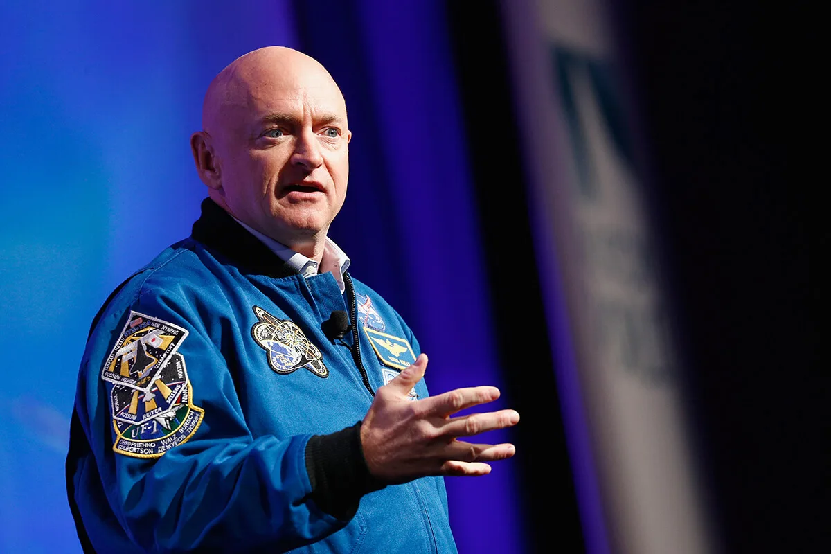 Mark Kelly speaking on a stage
