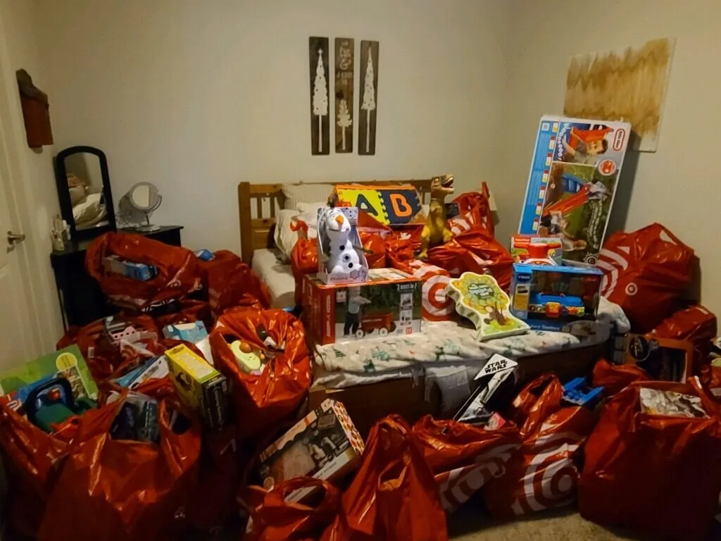 Small room filled with bags of gift donations