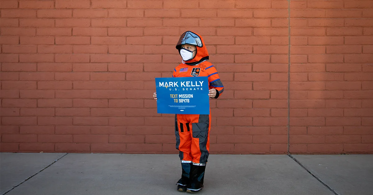 Julian Rosales poses for a portrait dressed as then-candidate Mark Kelly for Halloween on the last day of early voting at Fowler Elementary Early Voting Center in Phoenix, Arizona. Kelly went on to win his bid for US Senate, and was sworn in on Dec. 2, 2020.