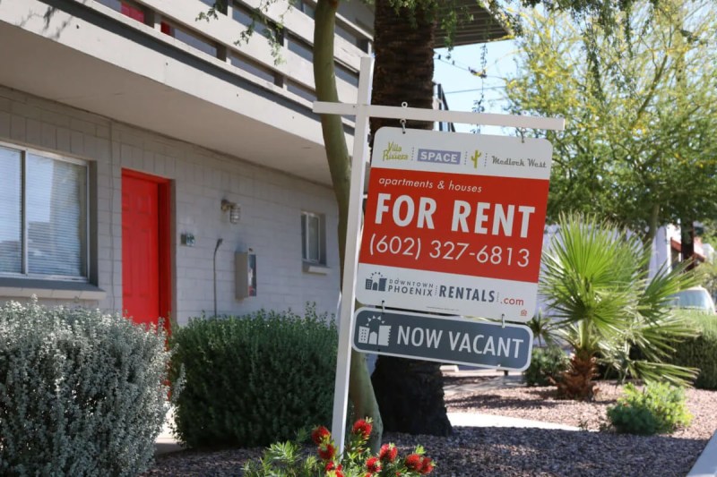 for rent sign in front of an apartment