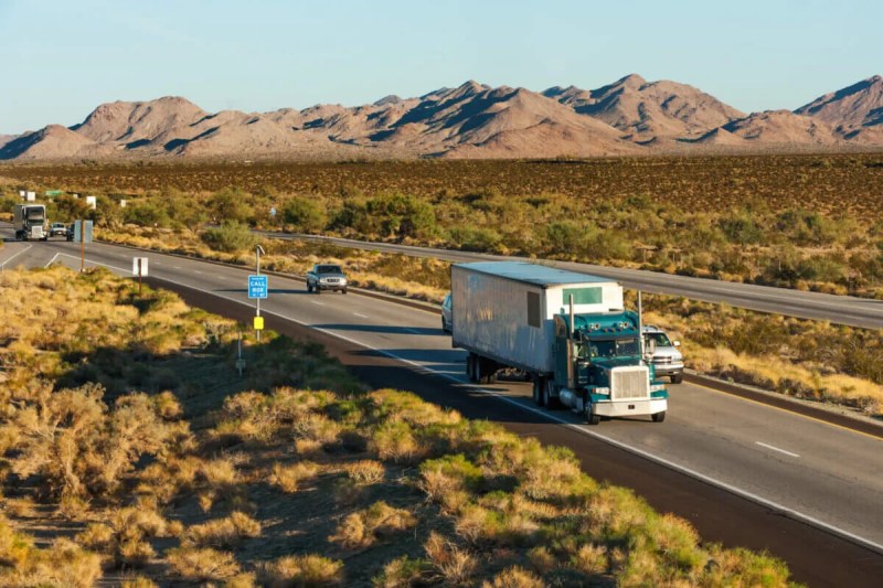 semi truck on Interstate 10 in desert area