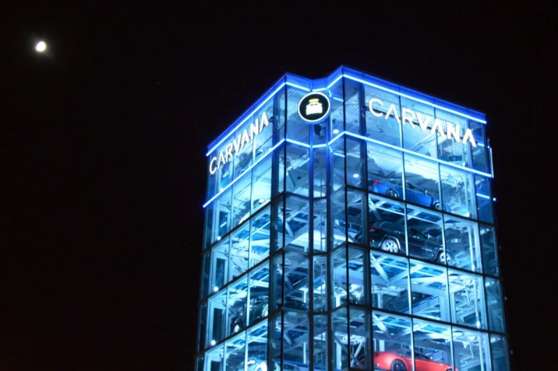 car vending machine with Carvana logo lit up at night