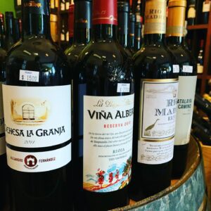 Four bottles of red wine.