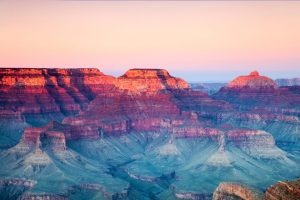 An view of the Grand Canyon from above, at sunrise.