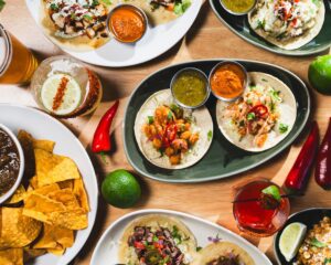 Several dishes including street tacos.
