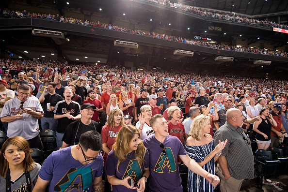 Fans enjoy an MLB game between the Arizona Diamondbacks and Colorado Rockies at Chase Field on July 1, 2017 in Phoenix, Arizona. Catching a game at Chase Field is one of the most fun things to do in Phoenix.