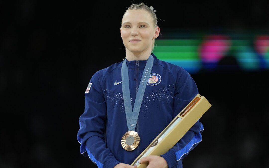Jade Carey of Phoenix fights through illness to win a bronze on vault in Paris