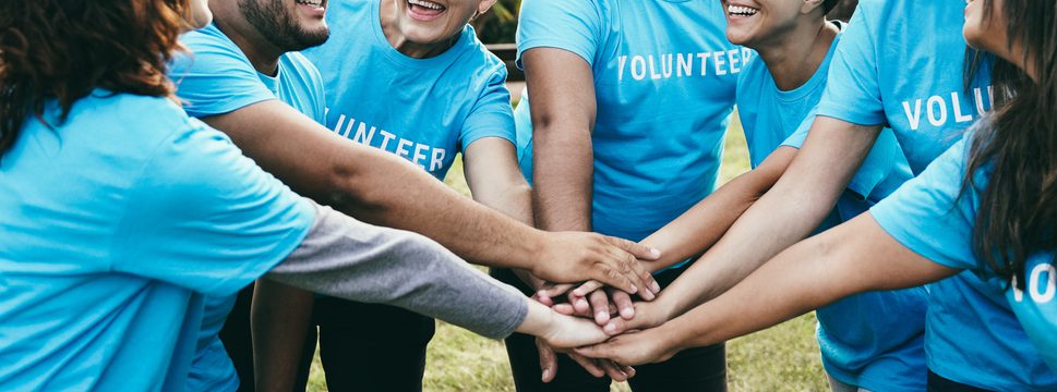 Volunteers joining in one of Tucson's many volunteer opportunities