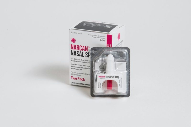Narcan spray and box against a white background.