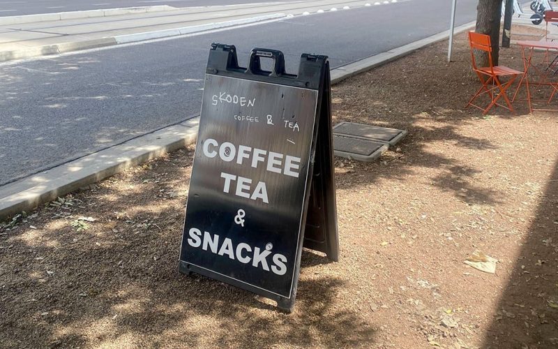 The Skoden Coffee & Tea sign in front of the shop on North Central Avenue in Phoenix