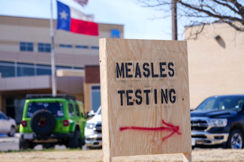 sign that says measles testing