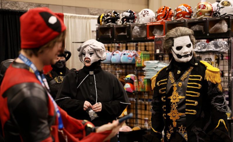 three people in costumes