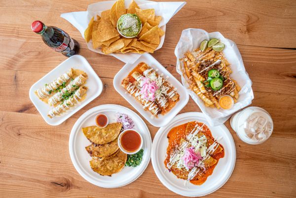 An array of Mexican dishes, including birria, from Rollies Mexican Patio