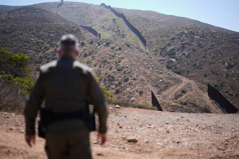 border agent looking out over the desert