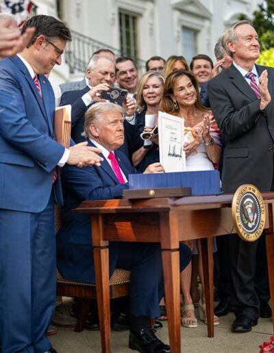 President Donald Trump signs the One Big Beautiful Bill Act on the South Lawn of the White House