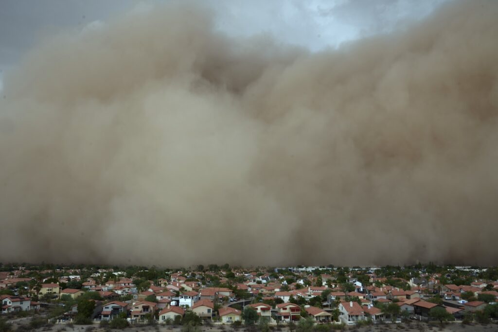 dust clouds rolling in over neighborhood