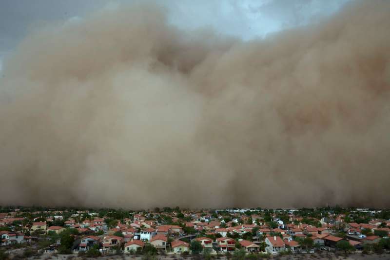 dust clouds rolling in over neighborhood