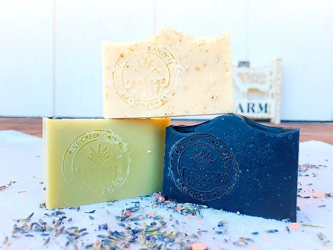 green, white, and blue soaps