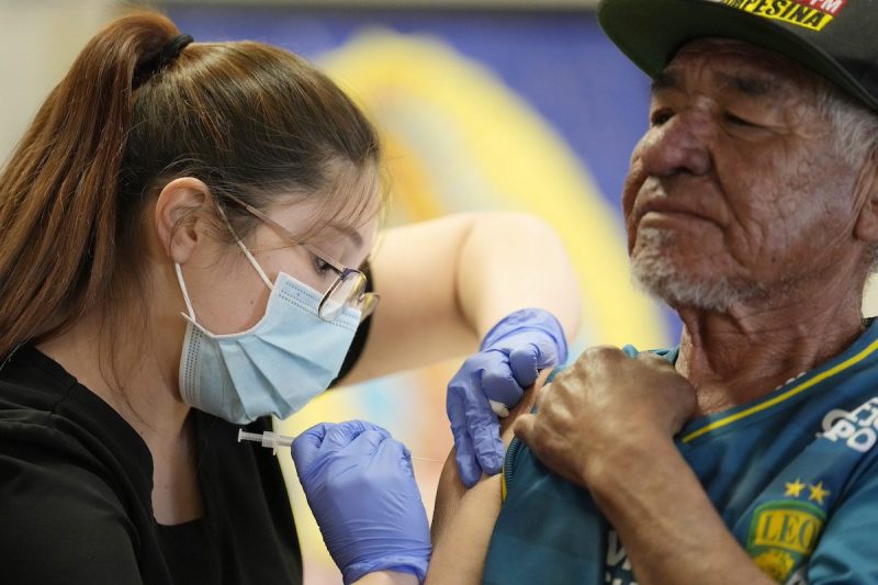 woman giving man a shot