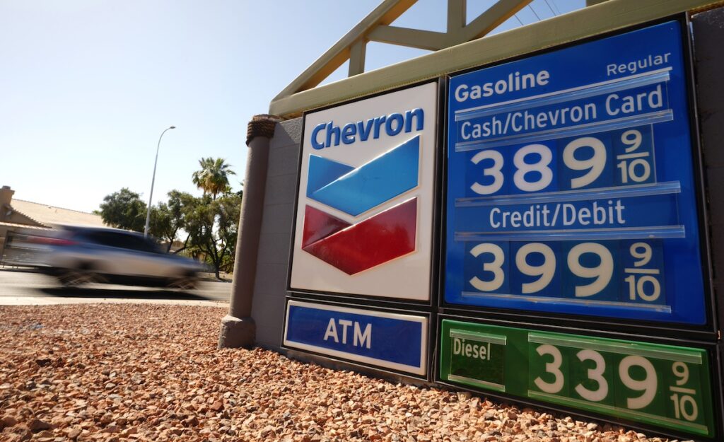 Chevron gas price sign showing prices near $4
