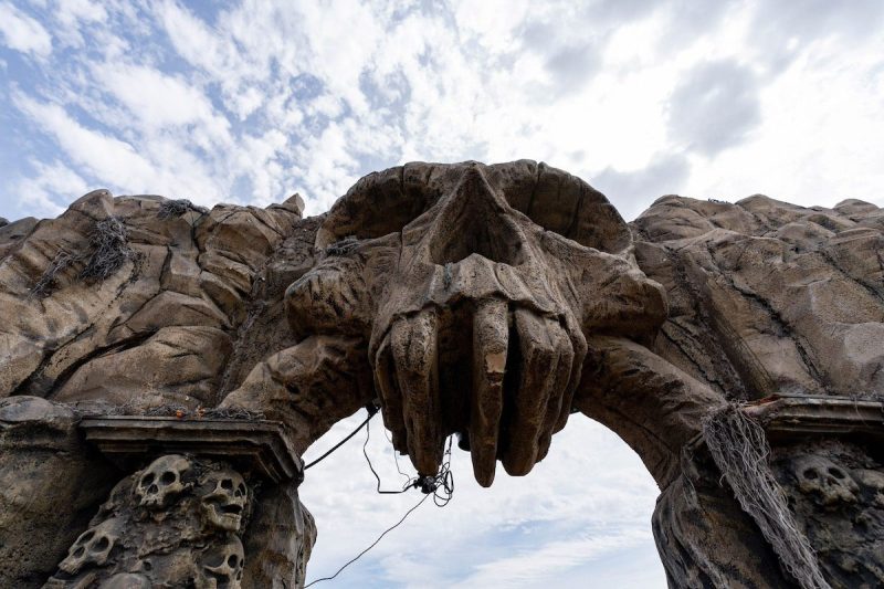 an archway including a large skull