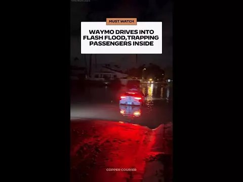 WATCH: Waymo drives into flash flood, trapping passengers inside