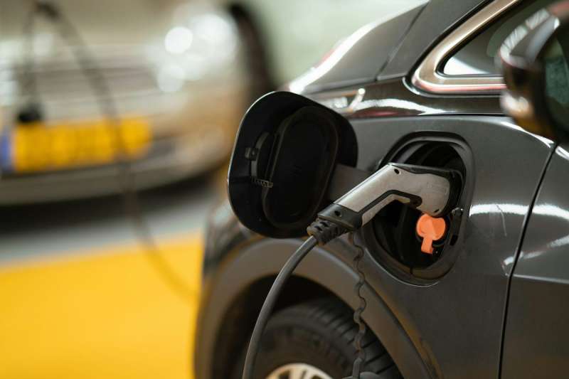 charger plugged into an electric car