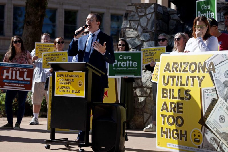 Jonathon Hill, candidate for the Arizona Corporation Commission, speaks at a news conference