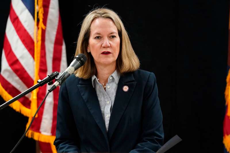 Arizona Attorney General Kris Mayes speaks into mic