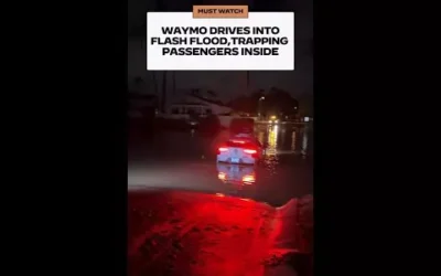 WATCH: Waymo drives into flash flood, trapping passengers inside
