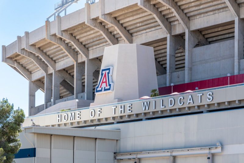 outside of football stadium showing U of A logo and Home of the Wildcats