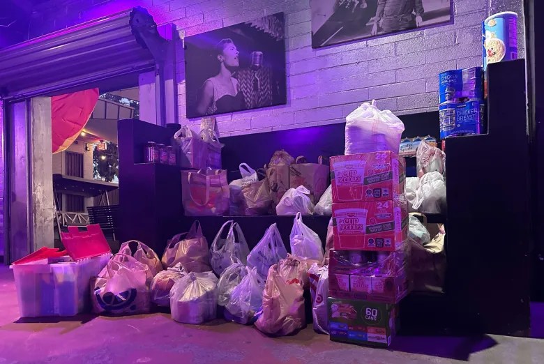 boxes of food piled up against wall