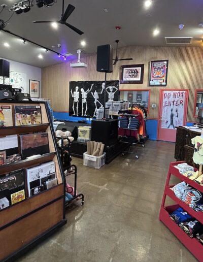 inside of a record store with a stage