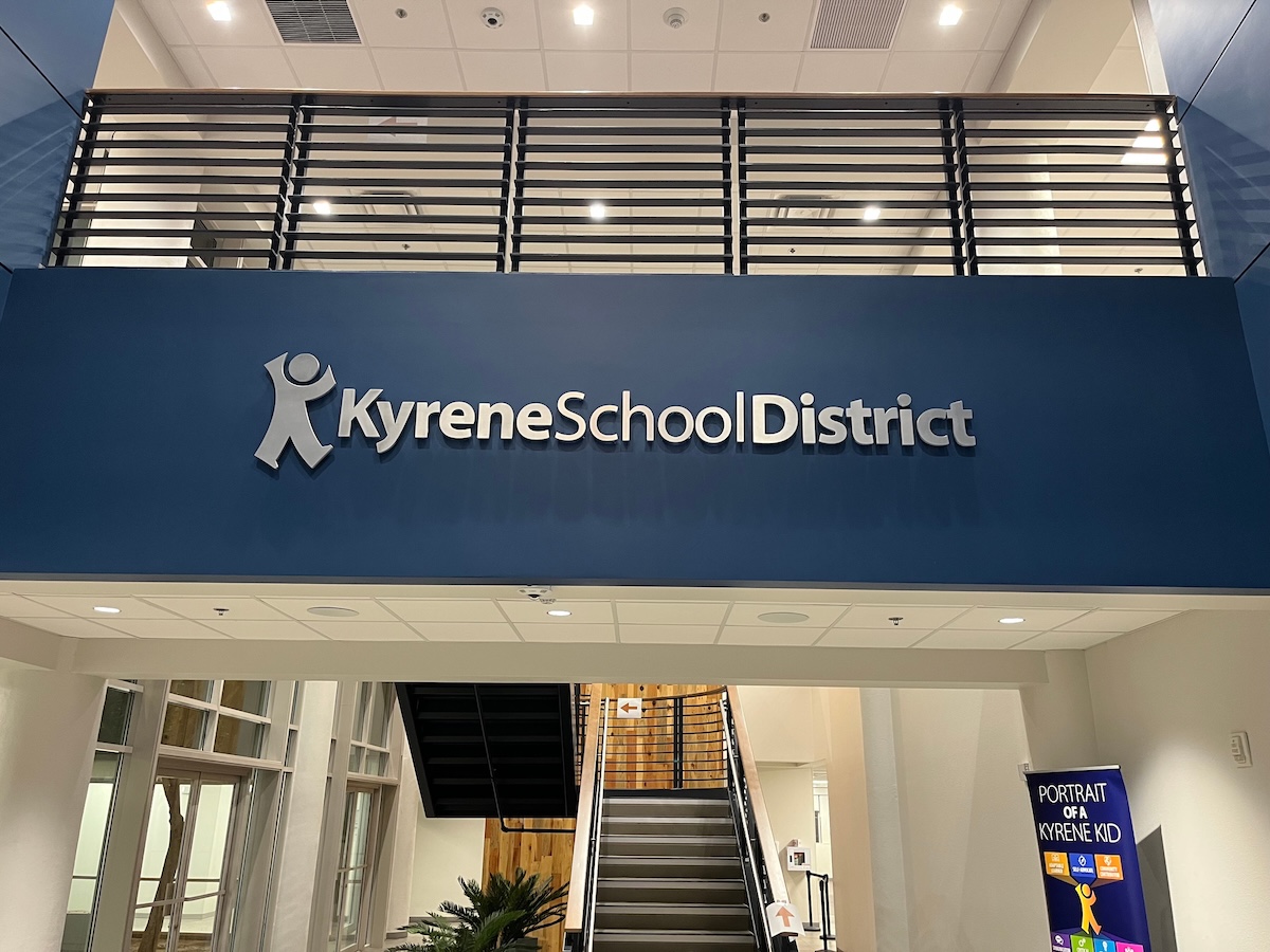 sign that says Kyrene School District on an interior wall