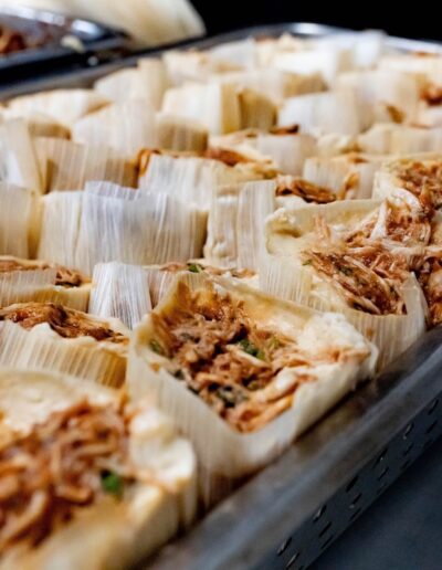 a pan full of chicken tamales