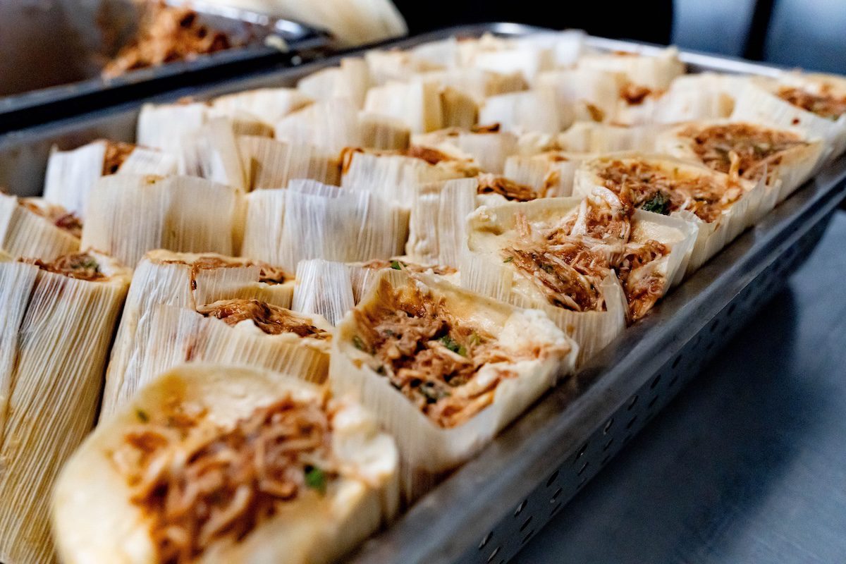a pan full of chicken tamales