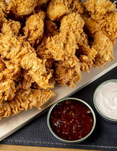 fried chicken tenders and two dipping sauces