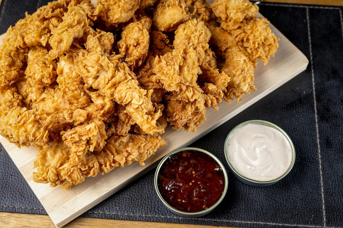 fried chicken tenders and two dipping sauces