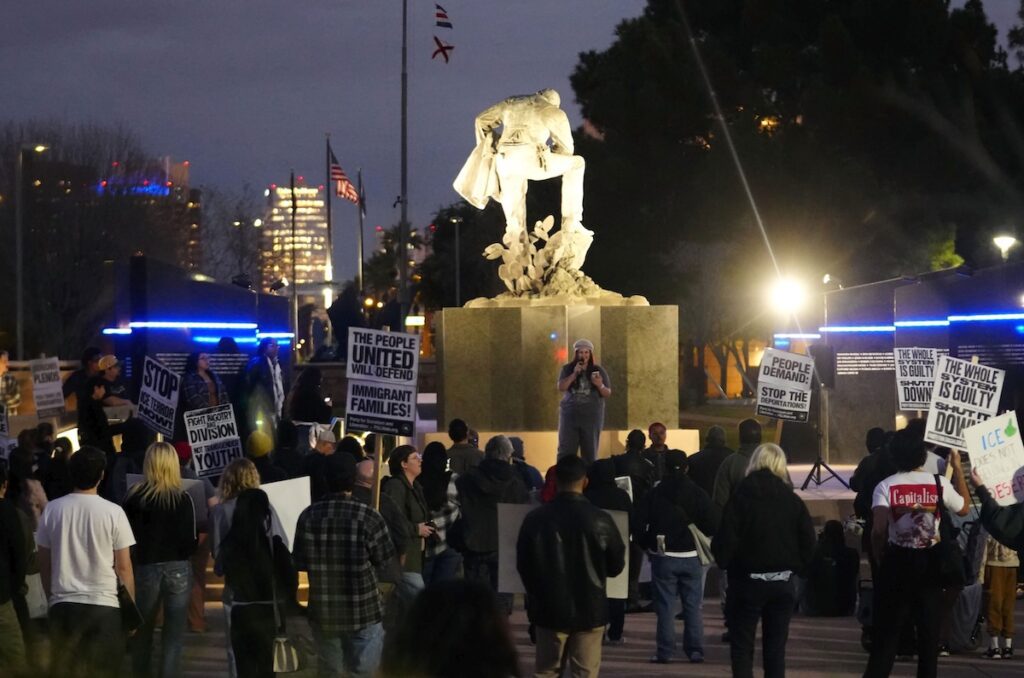 protest with anti-ICE signage