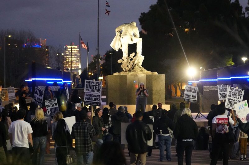 protest with anti-ICE signage