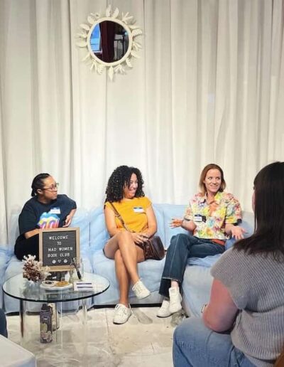 group of women sitting in circle