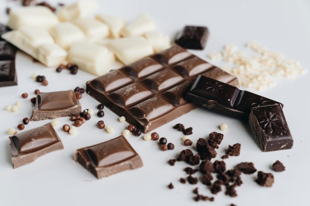 pieces of white, milk, and dark chocolate broken up