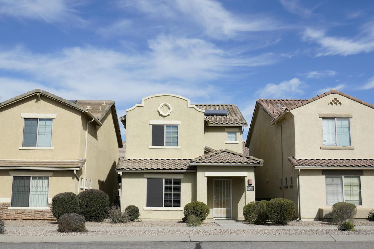 single-family homes next to each other on a street