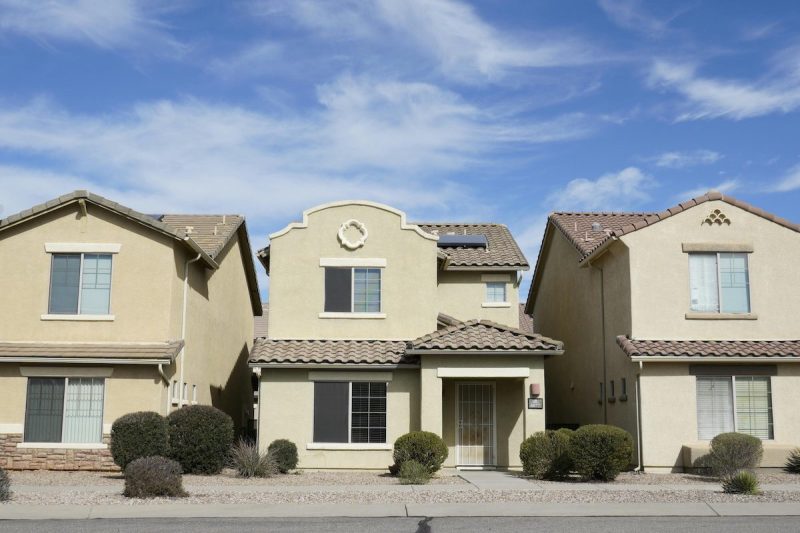 single-family homes next to each other on a street